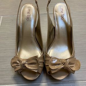 Nude patent leather sling backs